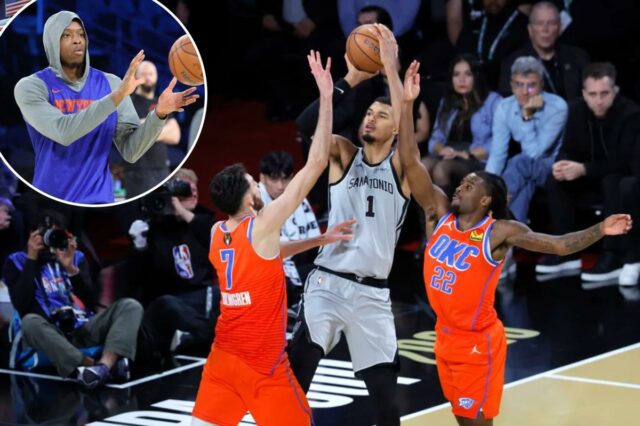 Victor Wembanyama é um unicórnio da NBA que atrapalha os Victor Wembanyama nº 1 do San Antonio Spurs arremessa entre Chet Holmgren nº 7 e Cason Wallace nº 22 do Oklahoma City Thunder no quarto quarto de um jogo semifinal da Emirates NBA Cup na T-Mobile Arena em 13 de dezembro de 2025 em Las Vegas, Nevada.