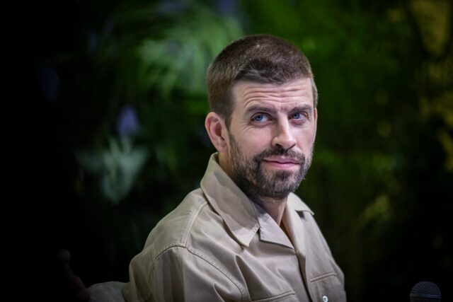 Wayne Rooney cobrindo a Liga dos Campeões em Anfield