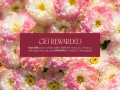 1-800-Flowers oferece US $ 20 de desconto em buquês ao usar o Apple Pay 1-800-Flowers oferece US $ 20 de desconto em buquês ao usar o Apple Pay | Banner promocional mostrado em cima de uma foto de flores