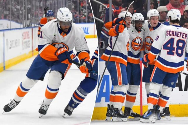 Curtis Lazar nº 20 do Edmonton Oilers luta pelo disco contra Anthony Duclair nº 11 do New York Islanders durante o segundo período do jogo em Rogers Place em 15 de janeiro de 2026, em Edmonton, Alberta, Canadá.