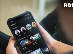 Aja surpreso – a verificação de idade baseada em IA do Roblox não protege as crianças Aja surpreso – a verificação de idade baseada em IA do Roblox não protege as crianças | Roblox mostrado na tela do smartphone