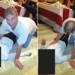 Andrew Mountbatten Windsor agachado de quatro sobre uma mulher deitada no chão, com o rosto obscurecido por um retângulo preto.