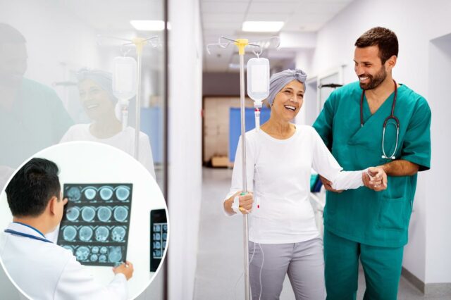 Uma mulher sorridente com um lenço na cabeça caminha com um suporte para soro intravenoso e um médico a ajuda.