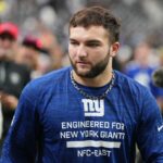 Cam Skattebo reage a John Harbaugh aceitando trabalho de treinador principal com gigantes