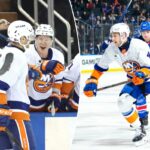 O defensor do New York Islanders, Carson Soucy # 4, é saudado por seus companheiros no banco após marcar um gol no segundo período.