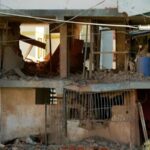 Casas danificadas em ataque dos EUA à Venezuela