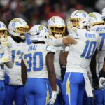 FOXBOROUGH, MASSACHUSETTS - JANUARY 11: Justin Herbert #10 of the Los Angeles Chargers in action during the AFC Wild Card Playoff game against the New England Patriots at Gillette Stadium on January 11, 2026 in Foxborough, Massachusetts. (Photo by Sarah Stier/Getty Images)