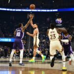 Curry marca double-double enquanto Warriors desmantelam Sacramento Kings