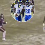 O safety dos Rams, Kam Curl (3), comemora com o safety Kamren Kinchens (26) após interceptar um passe destinado ao DJ Moore.