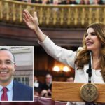 Oswald Feliz sorrindo.