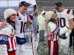 Drake Maye e sua esposa Ann Michael se abraçam após a vitória do Patriots no Campeonato AFC Drake Maye (r.) abraça sua esposa Ann Michael Maye (l.) após a vitória do Patriots no AFC Championship em Denver em 25 de janeiro de 2026.