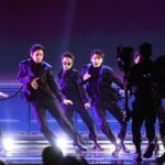 LAS VEGAS, NEVADA - APRIL 03: (L-R) RM, V, Jimin, Jungkook and Suga of BTS perform onstage during the 64th Annual GRAMMY Awards at MGM Grand Garden Arena on April 03, 2022 in Las Vegas, Nevada. (Photo by Rich Fury/Getty Images for The Recording Academy)
