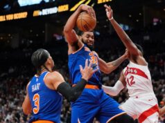 Karl-Anthony Towns, do Knicks, ignora as conversas sobre comércio que giram em torno dele Karl-Anthony Towns pega um de seus 22 rebotes, o melhor da temporada, durante a vitória dos Knicks por 119-92 sobre os Raptors em 28 de janeiro de 2026, em Toronto.