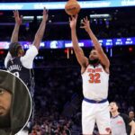 O pivô do New York Knicks, Karl-Anthony Towns #32, dá um chute enquanto o atacante do Dallas Mavericks, Naji Marshall #13, defende durante o terceiro quarto.