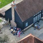 Katie Price foi avisada que poderá ser expulsa de sua nova casa de £ 4.500 por mês se a propriedade se tornar uma segunda 'Mansão Mucky', depois que lixo surgir fora da propriedade