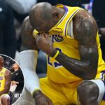 LeBron James reagindo no banco durante um vídeo-tributo.