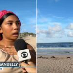 Lídia Emanuelle, cousin of shark attack victim Deivson Rocha Dantas, interviewed on a sandy beach.