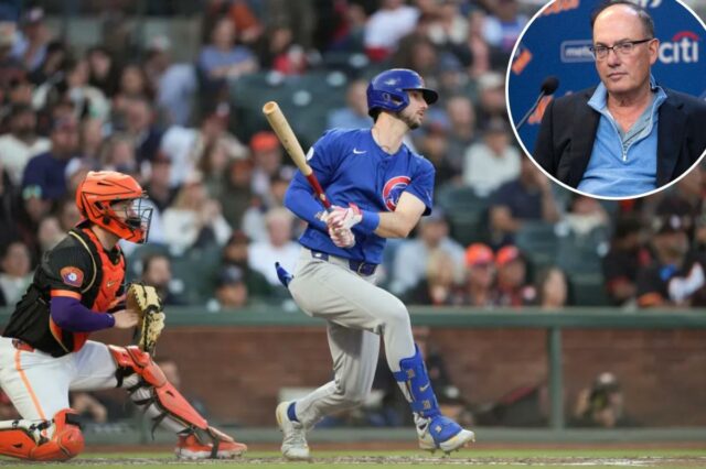 O batedor do Chicago Cubs, Seiya Suzuki, acerta uma bola com um receptor do San Francisco Giants em primeiro plano.