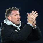 Michael Carrick e Wayne Rooney em ação.