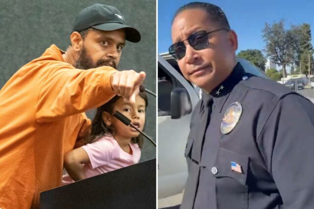 O vice-chefe do LAPD, Alan Hamilton, de uniforme e óculos escuros, olhando para a câmera, parado ao lado de uma van da polícia com a porta aberta.