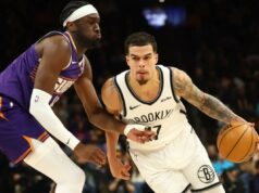 Nets desperdiçam grande esforço de Michael Porter Jr. e caem para o Suns em um caso agitado Michael Porter Jr., que marcou 36 pontos, o recorde do jogo, ataca Mark Williams durante a derrota do Nets por 106-102 para o Suns em 27 de janeiro de 2026 em Phoenix.