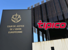 O acerto de contas do jogo online na Alemanha se aproxima com o caso histórico Tipico O acerto de contas do jogo online na Alemanha se aproxima com o caso histórico Tipico. Exterior do edifício do Tribunal de Justiça da União Europeia no Luxemburgo, com o logótipo Tipico sobreposto, simbolizando o histórico caso de jogo alemão perante o TJUE.