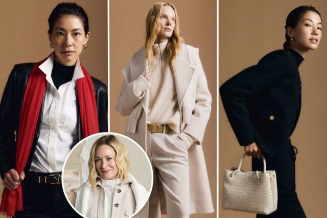 Uma mulher de jaqueta e calça pretas, segurando uma bolsa de tecido de cor clara.