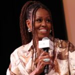 O visual do colete vermelho de Michelle Obama me deixou pronto para copiar todo o seu traje