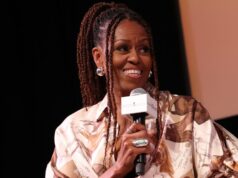 O visual do colete vermelho de Michelle Obama me deixou pronto para copiar todo o seu traje O visual do colete vermelho de Michelle Obama me deixou pronto para copiar todo o seu traje