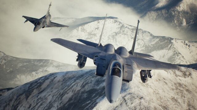 Two fighter jets soaring over a snowy mountaintop in a promotional screenshot for Ace Combat 7.