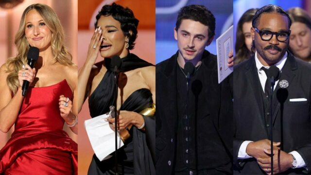 Close de uma mulher usando um alfinete no blazer lendo 