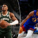 Giannis Antetokounmpo segurando uma bola de basquete, vestindo uma camisa verde do Milwaukee Bucks.