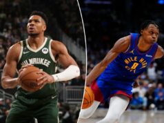 Previsão de Nuggets vs. Bucks: escolhas e probabilidades da NBA na sexta-feira Giannis Antetokounmpo segurando uma bola de basquete, vestindo uma camisa verde do Milwaukee Bucks.
