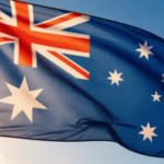 Uma fotografia em close da bandeira australiana. Seis provedores de apostas violam as regras de autoexclusão de jogos de azar, diz ACMA