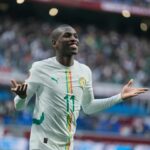 Kalidou Koulibaly, do Senegal, comemora o segundo gol durante a partida de futebol do grupo D da Copa das Nações Africanas entre Benin e Senegal em Tânger, Marrocos, terça-feira, 30 de dezembro de 2025. (AP Photo/Themba Hadebe)
