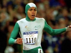 ‘Um presente do povo australiano’ Cathy Freeman cruzando a linha de chegada e ganhando o ouro nos 400 metros nas Olimpíadas de Sydney 2000.