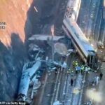 Pelo menos 39 pessoas foram confirmadas como mortas após uma colisão de trem de alta velocidade no sul da Espanha. Na foto: Equipes de emergência são vistas no local onde um trem de alta velocidade Iryo descarrilou e foi atropelado por outro trem enquanto os esforços de resgate continuam em Adamuz, sul da Espanha, em 19 de janeiro de 2026