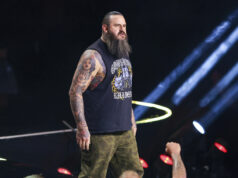 A Warner Bros. está deixando de lado um lutador anti-ICE? A torre de água da Warner Bros. é vista nos estúdios da Warner Bros. em Burbank, Califórnia, sexta-feira, 5 de dezembro de 2025. (AP Photo/Jae C. Hong)