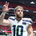 Cooper Kupp comemora vitória no Super Bowl de 2026 com a esposa Anna e seus três filhos