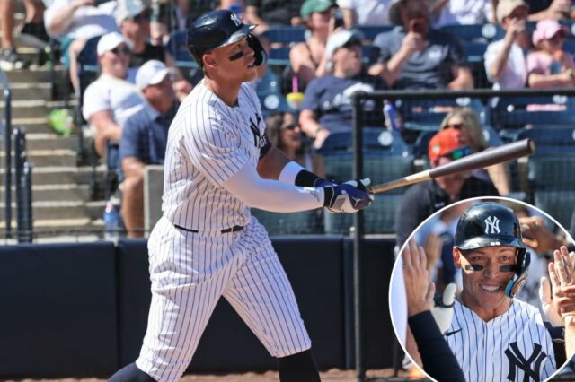 Aaron Judge acerta um home run no terceiro inning, a primeira de suas duas bolas longas na vitória dos Yankees por 20-3 no treinamento de primavera sobre os Tigers em 21 de fevereiro de 2026.