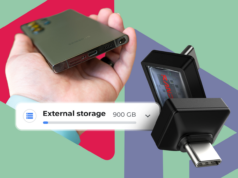 Agora é a hora de usar a porta USB-C do seu telefone para armazenamento extra Um smartphone rotulado como 512 GB fisgado como uma isca, cercado por notas de dólar caindo, com dois telefones de 256 GB abaixo.