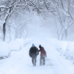 People walk through the streets of Brooklyn in blizzard conditions on February 23, 2026 in New York City.