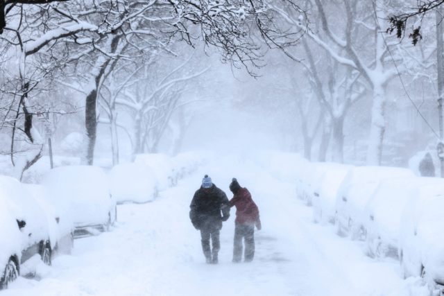 People walk through the streets of Brooklyn in blizzard conditions on February 23, 2026 in New York City.