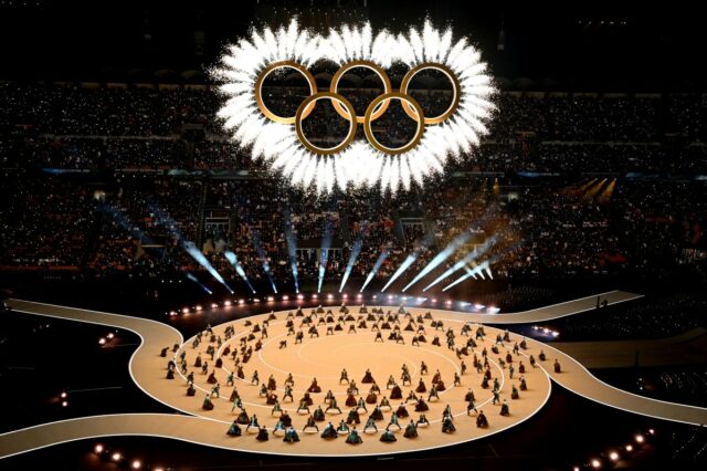 As Olimpíadas de Inverno começam com reação: cerimônia 'chata' enterrada em anúncios
