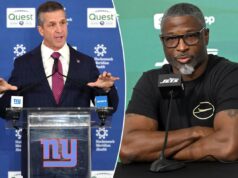As apostas esportivas sugerem que Jets e Giants podem surpreender em 2026, conforme os totais de vitórias são revelados Aaron Glenn falando à mídia em Florham Park, NJ.