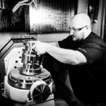 A man assembles a fusion device.