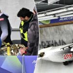 Jakob Mandlbauer, da Áustria, em uma maca após uma queda de bobsleigh durante os Jogos Olímpicos de Inverno de Milão Cortina 2026.