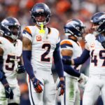 Denver Broncos players during Las Vegas Raiders game