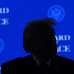 Desenho animado de Mike Luckovich