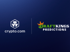 DraftKings Predictions vê expansão por meio de acordo com Crypto.com Fundo azul com o logotipo DraftKings Predictions à direita e Crypto.com à esquerda.